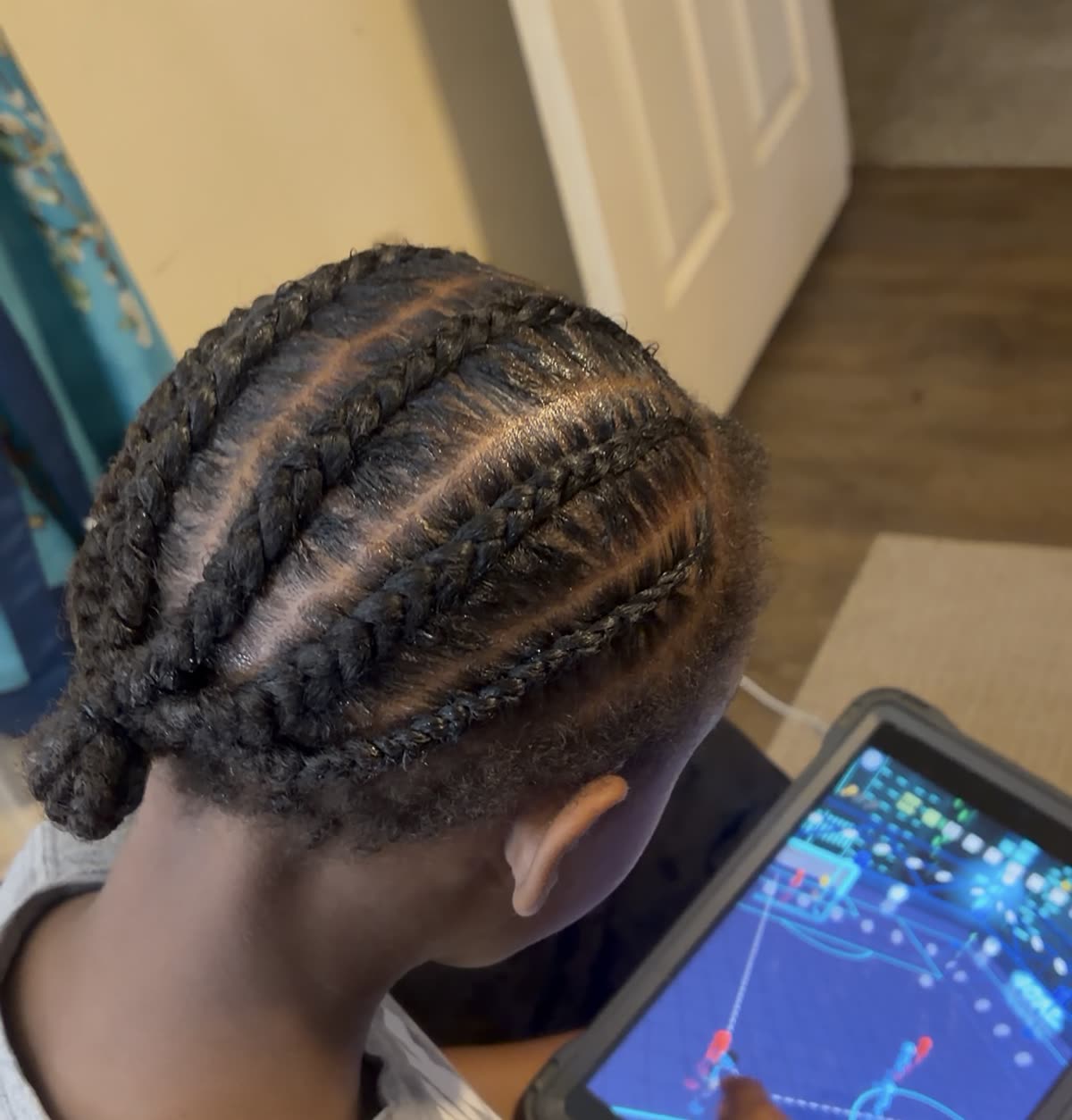 Clean straight-back scalp braids sectioned evenly